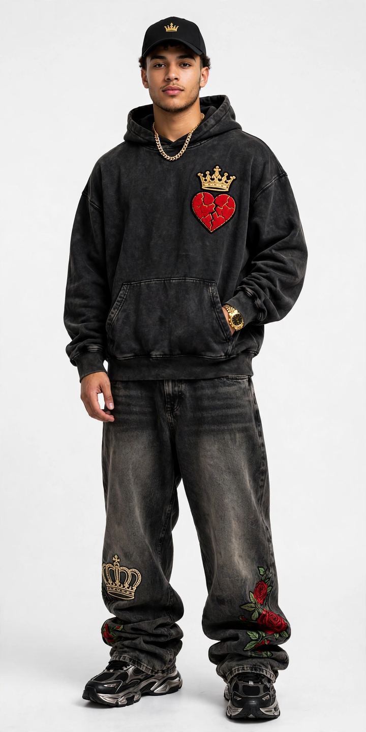 Full RellyWear fit — washed black crown-and-cracked-heart hoodie, stacked rose denim, crown cap and chrome runners